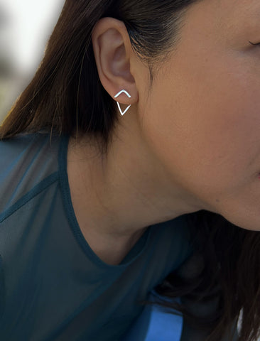 Image Title Female model wearing small modern geometric minimalist simple 2-way convertible TRILL dainty wishbone diamond front back ear jacket stud earrings in 925 sterling silver by Sonia Hou, a celebrity AAPI Chinese demi-fine fashion costume jewelry designer