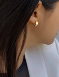 Female model wearing BOSS 18K GOLD VERMEIL OVER STERLING SILVER MINIMALIST CHUBBY MINI SMALL HOOP EARRINGS by Sonia Hou Jewelry