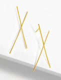 Inclusive Asian Inspired Chopsticks Minimalist Long Thin Dangle Earrings in 18K Gold Vermeil With Sterling Silver base by Sonia Hou, a celebrity AAPI demi-fine jewelry designer. 
