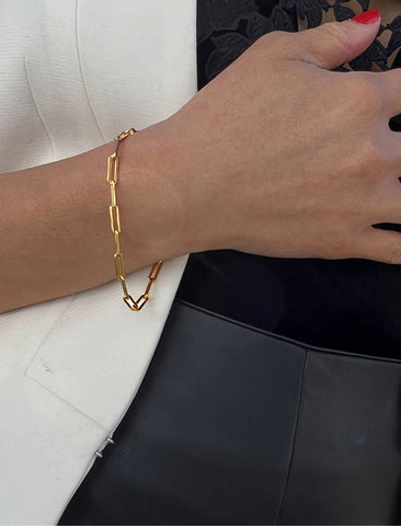 Image Title Female Model wearing Essential Minimalist Bold Thick Chunky Link Chain Paperclip Layering Stacking Statement Rectangular Bracelet in 18K Gold Vermeil With Sterling Silver base by Sonia Hou, a celebrity Chinese AAPI demi-fine jewelry designer