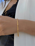 Image Title Female Model wearing Essential Minimalist Bold Thick Chunky Link Chain Paperclip Layering Stacking Statement Rectangular Bracelet in 18K Gold Vermeil With Sterling Silver base by Sonia Hou, a celebrity Chinese AAPI demi-fine jewelry designer