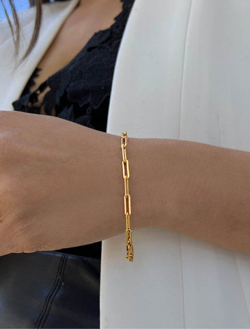 Image Title Female Model wearing Essential Minimalist Bold Thick Chunky Link Chain Paperclip Layering Stacking Statement Rectangular Bracelet in 18K Gold Vermeil With Sterling Silver base by Sonia Hou, a celebrity Chinese AAPI demi-fine jewelry designer