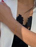 Image Title Female Model wearing Essential Minimalist Bold Thick Chunky Link Chain Paperclip Layering Stacking Statement Rectangular Bracelet in 18K Gold Vermeil With Sterling Silver base by Sonia Hou, a celebrity Chinese AAPI demi-fine jewelry designer