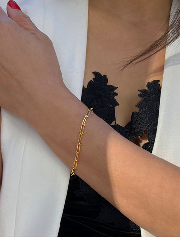 Image Title Female Model wearing Essential Minimalist Bold Thick Chunky Link Chain Paperclip Layering Stacking Statement Rectangular Bracelet in 18K Gold Vermeil With Sterling Silver base by Sonia Hou, a celebrity Chinese AAPI demi-fine jewelry designer