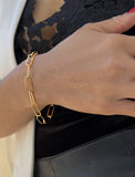 Female Model wearing Essential Minimalist Large Bold Thick Chunky Link Chain Paperclip Layering Stacking Statement Bracelet in 18K Gold Vermeil With Sterling Silver base by Sonia Hou, a celebrity Chinese AAPI demi-fine jewelry designer