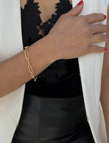 Image Title Female Model wearing Essential Minimalist Large Bold Thick Chunky Link Chain Paperclip Layering Stacking Statement Bracelet in 18K Gold Vermeil With Sterling Silver base by Sonia Hou, a celebrity Chinese AAPI demi-fine jewelry designer