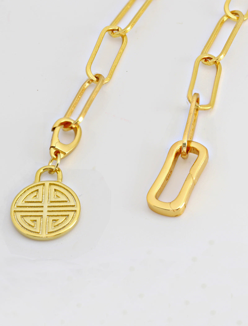 Image Title Asian Inspired Minimalist 2 Way Convertible Lucky Charm Coin Four Blessings Pendant With A Paperclip Link Chain Statement Bold Thick Chunky Layering Stacking Rectangular Bracelet in 18K Gold Vermeil With Sterling Silver base by Sonia Hou, a celebrity AAPI Chinese demi-fine jewelry designer