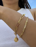 Image Title Female model wearing Asian Inspired Minimalist 2 Way Convertible Lucky Charm Coin Four Blessings Pendant With A Paperclip Link Chain Statement Bold Thick Chunky Layering Stacking Rectangular Bracelet in 18K Gold Vermeil With Sterling Silver base by Sonia Hou, a celebrity AAPI Chinese demi-fine jewelry designer