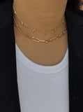 Image Title Female model wearing gender neutral Asian Inspired Lucky Charm Four Blessings 3-Way Convertible Coin Pendant with a Large Paperclip Link Chain Statement Bold Thick Chunky Layering Stacking Rectangular Necklace in 18K Gold Vermeil Over Sterling Silver by Sonia Hou, a celebrity AAPI Chinese demi-fine jewelry designer
