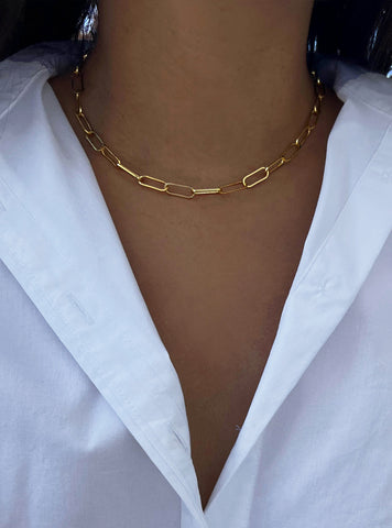 Image Title Female model wearing gender neutral Asian Inspired Lucky Charm Four Blessings 3-Way Convertible Coin Pendant with a Large Paperclip Link Chain Statement Bold Thick Chunky Layering Stacking Rectangular Necklace in 18K Gold Vermeil Over Sterling Silver by Sonia Hou, a celebrity AAPI Chinese demi-fine jewelry designer