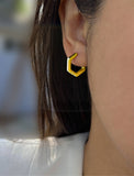 Image Title Female model wearing minimalist mini tiny small chunky bold thick dainty stacking layering statement round INNOVATE Hexagon Huggie Hoop Earrings in 18K Gold Vermeil With 925 Sterling Silver base by Sonia Hou, a celebrity AAPI Chinese demi-fine jewelry designer