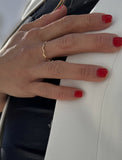 Image Title Female model wearing Asian Inspired Thin Wavy Ramen Noodle Stacking Ring in 18K Gold Vermeil with Sterling Silver base by Sonia Hou, a celebrity AAPI Chinese demi-fine jewelry designer
