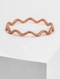 Image Title Asian Inspired Thin Wavy Ramen Noodle Stacking Ring in 18K Rose Gold Vermeil with Sterling Silver base by Sonia Hou, a celebrity AAPI Chinese demi-fine jewelry designer