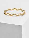 Image Title Asian Inspired Thin Wavy Ramen Noodle Stacking Ring in 925 Sterling Silver base by Sonia Hou, a celebrity AAPI Chinese demi-fine jewelry designer