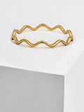 Image Title Asian Inspired Thin Wavy Ramen Noodle Stacking Ring in 925 Sterling Silver base by Sonia Hou, a celebrity AAPI Chinese demi-fine jewelry designer