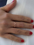 Image Title Female model wearing Asian Inspired Thin Wavy Ramen Noodle Stacking Ring in 18K Rose Gold Vermeil with Sterling Silver base by Sonia Hou, a celebrity AAPI Chinese demi-fine jewelry designer