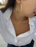 Image Title Female model wearing big medium large thin round circle PERFECT 50mm 2 inch hoop stacking lightweight everyday statement earrings in 18K Gold Vermeil With 925 Sterling Silver base by Sonia Hou, a celebrity AAPI Chinese demi-fine jewelry designer