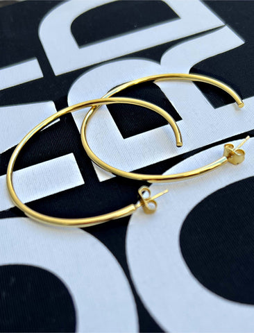 Image Title Big medium large thin round circle PERFECT 50mm or 2 inch hoop stacking lightweight everyday statement earrings in 18K Gold Vermeil With 925 Sterling Silver base by Sonia Hou, a celebrity AAPI Chinese demi-fine jewelry designer