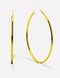 Image Title Female model wearing big medium large thin round circle PERFECT 50mm or 2 inch hoop stacking lightweight everyday statement earrings in 18K Gold Vermeil with 925 Sterling Silver base by Sonia Hou, a celebrity AAPI Chinese demi-fine jewelry designer