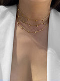 Image Title Female model wearing inclusive Asian inspired thin Rice bead minimalist chain layering stacking necklace in 18K gold vermeil with sterling silver base by Sonia Hou, a celebrity Chinese AAPI demi-fine jewelry designer