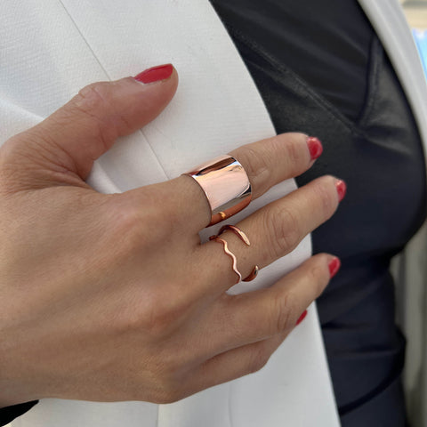 Image Title Female model wearing Asian Inspired Thin Wavy Ramen Noodle Stacking Ring in 18K Rose Gold Vermeil with Sterling Silver base by Sonia Hou, a celebrity AAPI Chinese demi-fine jewelry designer