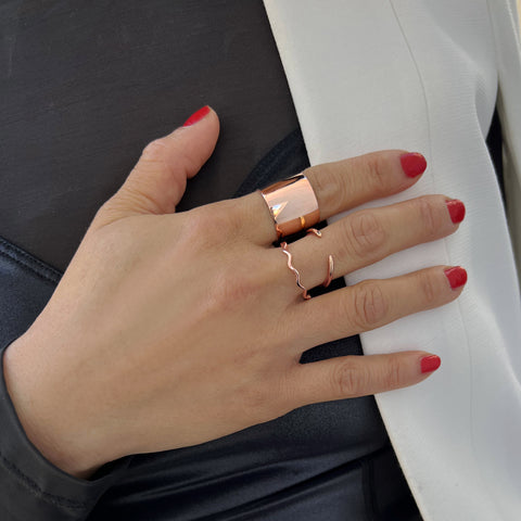 Image Title Female model wearing Asian Inspired Thin Wavy Ramen Noodle Stacking Ring in 18K Rose Gold Vermeil with Sterling Silver base by Sonia Hou, a celebrity AAPI Chinese demi-fine jewelry designer