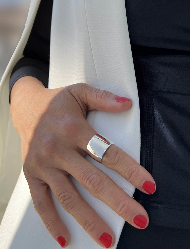 Image Title Female model wearing wide RICH thick bold chunky statement cigar band ring in 925 sterling silver by Sonia Hou, a celebrity AAPI Chinese demi-fine jewelry designer