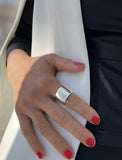 Image Title Female model wearing wide RICH thick bold chunky statement cigar band ring in 925 sterling silver by Sonia Hou, a celebrity AAPI Chinese demi-fine jewelry designer