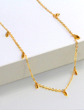 Image Title Female model wearing inclusive Asian Inspired Thin Rice Bead Minimalist Chain Layering Stacking Necklace in 18K Gold Vermeil With Sterling Silver base by Sonia Hou, a celebrity AAPI Chinese demi-fine jewelry designer