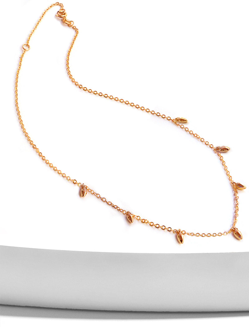 Image Title Inclusive Asian inspired thin Rice bead minimalist chain layering stacking necklace in 18K rose gold vermeil with a 925 sterling silver base by Sonia Hou, a celebrity Chinese AAPI demi-fine jewelry designer