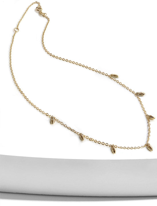 Inclusive Asian inspired thin Rice bead minimalist chain layering stacking necklace in 925 sterling silver by Sonia Hou, a celebrity Chinese AAPI demi-fine jewelry designer