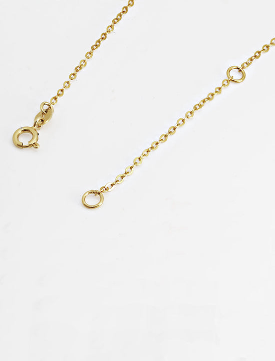 Inclusive Asian inspired thin Rice bead minimalist chain layering stacking necklace in 925 sterling silver by Sonia Hou, a celebrity Chinese AAPI demi-fine jewelry designer