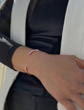Image Title Female model wearing adjustable minimalist simple Success Thin Cuff Chunky Bold Layering Stacking Statement 2 Way convertible Bangle Cuff Open Bracelet in 18K Rose Gold Vermeil with 925 sterling silver base by Sonia Hou, a celebrity AAPI Chinese demi-fine fashion costume jewelry designer