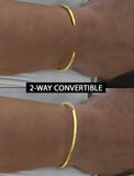 Image Title Female model wearing adjustable minimalist simple Success Thin Cuff Chunky Bold Layering Stacking Statement 2 Way convertible Bangle Cuff Open Bracelet in 18K Gold Vermeil with 925 sterling silver base by Sonia Hou, a celebrity AAPI Chinese demi-fine fashion costume jewelry designer