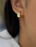 Female model wearing BOSS 18K GOLD VERMEIL STERLING SILVER CHUBBY MINI HOOP EARRINGS by Sonia Hou Jewelry