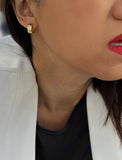 Female model wearing BOSS 18K GOLD VERMEIL OVER STERLING SILVER MINIMALIST CHUBBY MINI SMALL HOOP EARRINGS by Sonia Hou Jewelry