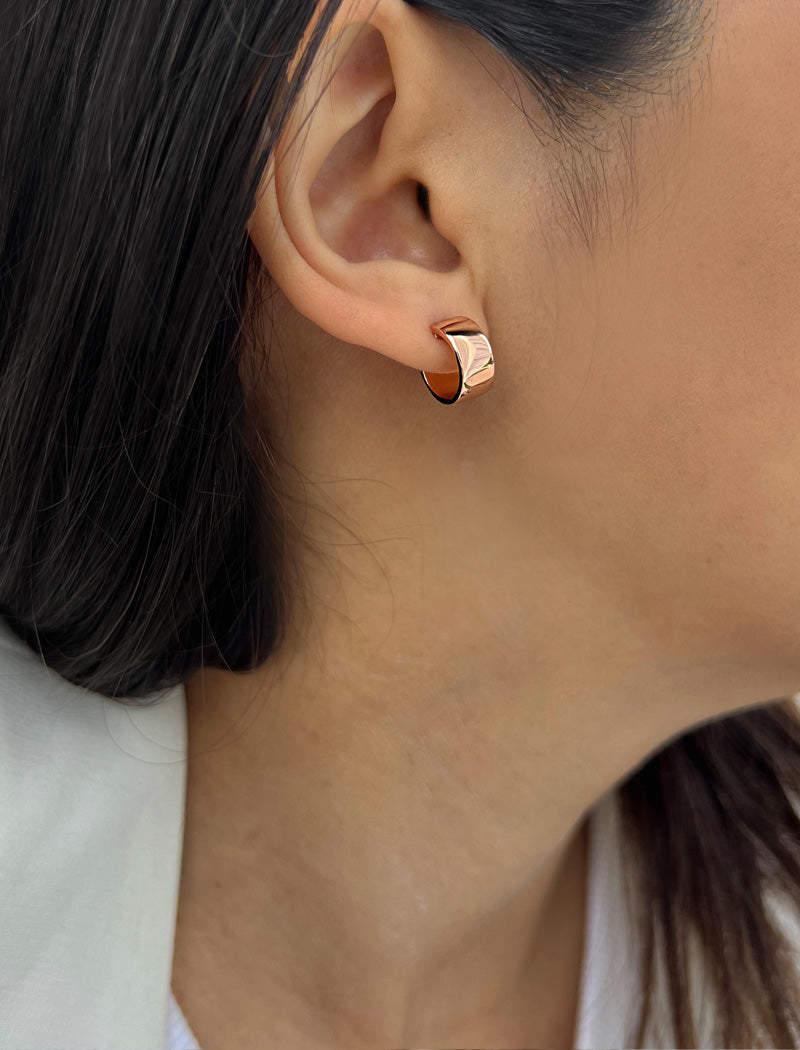 Female model wearing BOSS 18K ROSE GOLD VERMEIL OVER STERLING SILVER MINIMALIST CHUBBY MINI SMALL HOOP EARRINGS by Sonia Hou Jewelry