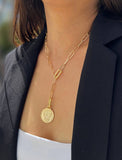 Female model wearing gender neutral, culturally inclusive Day Of The Dead Mexican Sugar Skull Charm 3-Way Convertible Coin Pendant with a Large Paperclip Link Chain Statement Bold Thick Chunky Layering Stacking Rectangular Necklace in 18K Gold Vermeil Over Sterling Silver by Sonia Hou, a celebrity AAPI Chinese demi-fine jewelry designer. This holiday is also known as Dia De Los Muertos, and can also be worn for Halloween!