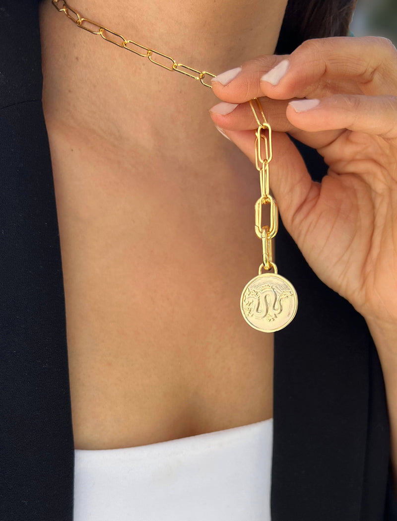 Female model wearing gender neutral Asian Inspired Lucky Chinese Zodiac Dragon Charm 3-Way Convertible Coin Pendant with a Large Paperclip Link Chain Statement Bold Thick Chunky Layering Stacking Rectangular Necklace in 18K Gold Vermeil Over Sterling Silver by Sonia Hou, a celebrity AAPI Chinese demi-fine jewelry designer. Promotes good luck, wisdom, wealth, power and good fortune