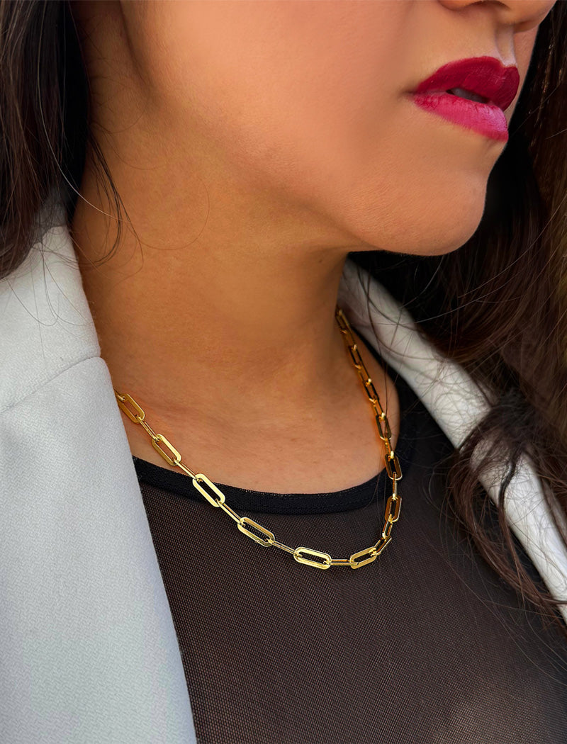 18K Gold vermeil (Sterling silver base) chain layering necklace on a person's neck.  Our medium Essential paperclip link chain necklace is perfect for everyday wear. Designed by AAPI celebrity jewelry designer SONIA HOU.