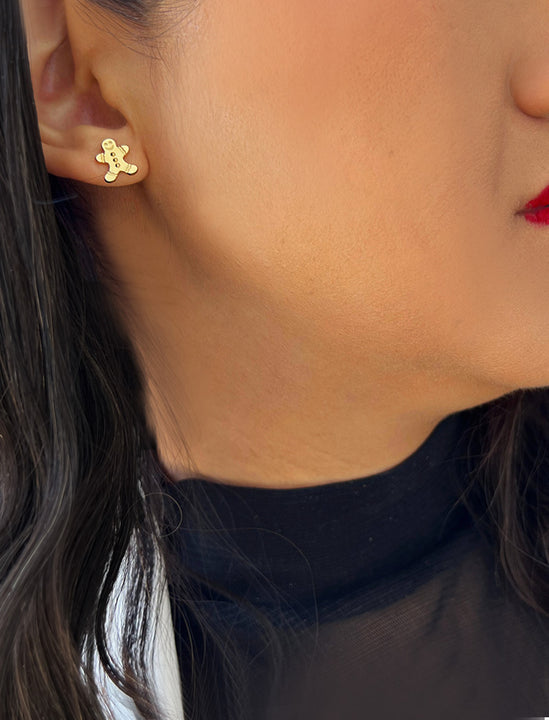 Female model wearing Gingerbread Holiday Festive Christmas Earrings in 18K Gold Over With Sterling Silver by AAPI Celebrity Jewelry Designer Sonia Hou 