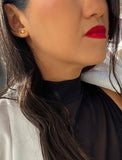 Female model wearing Holiday Sparkle Festive Christmas Earrings in 18K Gold Over With Sterling Silver by AAPI Celebrity Jewelry Designer Sonia Hou 