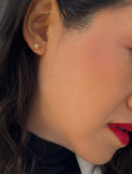 Female model wearing Holiday Sparkle Festive Christmas Earrings in 18K Gold Over With Sterling Silver by AAPI Celebrity Jewelry Designer Sonia Hou 