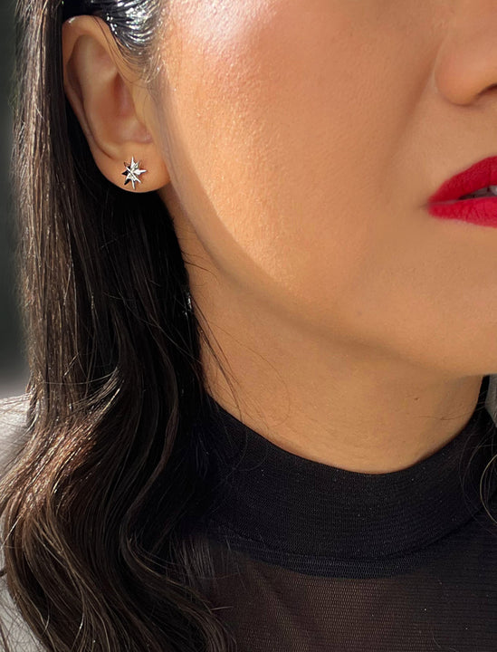 Female model wearing Holiday Sparkle Festive Christmas Earrings in Sterling Silver by AAPI Celebrity Jewelry Designer Sonia Hou 