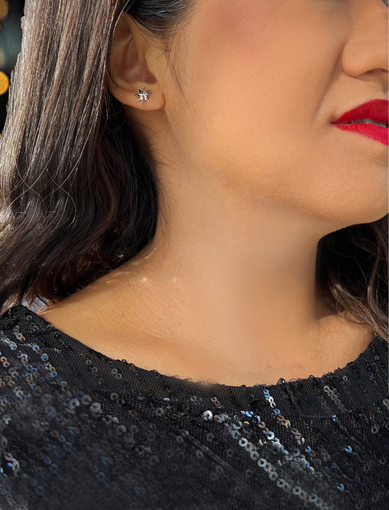 Female model wearing Holiday Sparkle Festive Christmas Earrings in Sterling Silver by AAPI Celebrity Jewelry Designer Sonia Hou 