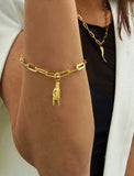 18K gold vermeil (sterling silver base) chain bracelet with a hand charm on a wrist. Rooted in ancient Italian tradition, the Italian Hand — also known as Mano Cornuta or the “Horned Hand” — has long been worn as a protective amulet to ward off the Evil Eye and negative energy. Symbolizes strength, defense, and good fortune. Designed by AAPI celebrity jewelry designer SONIA HOU.
