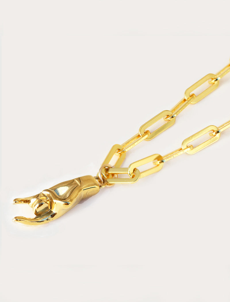 Italian Hand pendant—also known as Mano Cornuta or the “Horned Hand” amulet in 18K Gold Vermeil (sterling Silver base).  Designed for everyone who values inclusivity, diversity, and meaning, it’s a timeless statement of strength and modern style. It's perfect for everyday wear. Designed by AAPI celebrity jewelry designer SONIA HOU.