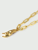 18K Gold PVD Stainless steel waterproof chain bracelet with a charm worn by a person in a brown shirt. Rooted in ancient Italian tradition, the Italian Hand — also known as Mano Cornuta or the “Horned Hand” — has long been worn as a protective amulet to ward off the Evil Eye and negative energy. Symbolizes strength, defense, and good fortune. Designed by AAPI celebrity jewelry designer SONIA HOU.
