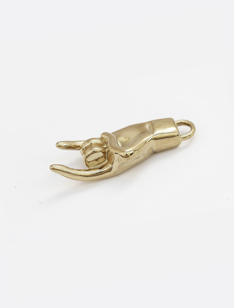 Rooted in ancient Italian tradition, the Italian Hand — also known as Mano Cornuta or the “Horned Hand” — has long been worn as a protective amulet to ward off the Evil Eye and negative energy. Symbolizes strength, defense, and good fortune. Made in Stainless Steel. Designed by AAPI celebrity jewelry designer SONIA HOU.
