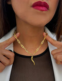 Inspired by centuries-old Italian tradition, this photo showcases a person wearing a modern chain pendant necklace with the Italian Horn —also known as the cornicello—a powerful emblem of protection, strength, and good fortune. Made of 18K Gold Vermeil (sterling Silver base).  Designed for everyone who values inclusivity, diversity, and meaning, it’s a timeless statement of strength and modern style. It's perfect for everyday wear. Designed by AAPI celebrity jewelry designer SONIA HOU.